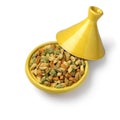 Tajine with colorful miniature shortbread cookies on white background