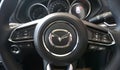 Tak Thailand January 4, 2022 Mazda sports car steering wheel modern design safe for all driving and traveling, taken from the