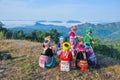 Group beautiful girls with their colorful dresses playimg traditional game