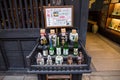 Takayama`s well-known sake brewery displays for sale to tourists in front of the traditional hous