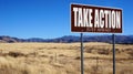 Take Action Just Ahead brown road sign