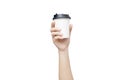 Take away coffee cup background. Female hand holding a coffee paper cup isolated on white background with clipping path. Close-up Royalty Free Stock Photo