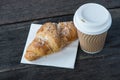 Take away coffee and fresh croissant Royalty Free Stock Photo