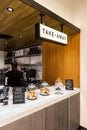 Take Away counter of Black, white and wooden industrial decorated interior design, Coffee bar decorated with white granite.