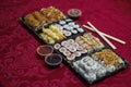 Take-away delivery sushi box, Japanese, and bowl of soy sauce Royalty Free Stock Photo