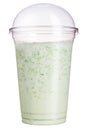 Take-away drink. Refreshing drink in a plastic cup. Fruity smoothies or milkshake.