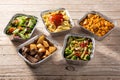 Take away healthy food in foil boxes Royalty Free Stock Photo