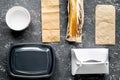 Take away with sandwich and paper bags on table background top view Royalty Free Stock Photo