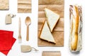 Take away with sandwich and paper bags on table background top view Royalty Free Stock Photo