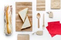 Take away with sandwich and paper bags on table background top view Royalty Free Stock Photo