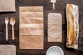 Take away with sandwich and paper bags table background top view mock-up Royalty Free Stock Photo
