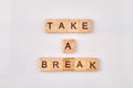 Take a break text on cubes on white background.