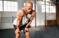 Take a breather you need it. a young man taking a break during his workout routine. Royalty Free Stock Photo