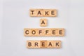Take a coffee break text on cubes.