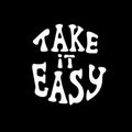 Take it easy lettering in groovy style isolated design in in a circle on black