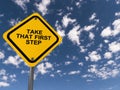 take that first step traffic sign on blue sky Royalty Free Stock Photo