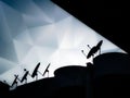 cubist style blue and grey coloured triangulation sky abstract design from rooftop satellite dishes Royalty Free Stock Photo