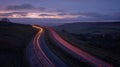 Take a journey through the serene countryside hills guided by the captivating light trails above Royalty Free Stock Photo
