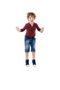 Take a leap if you love life. Studio shot of a cute little boy jumping for joy against a white background. Royalty Free Stock Photo