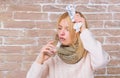 Take medications to reduce fever. What to know about breaking fever. Woman tousled hair scarf hold glass water and Royalty Free Stock Photo