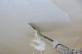 Take off in the popcorn ceiling home wall texture removal Royalty Free Stock Photo