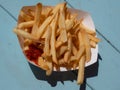 Take-Out French Fries On A Camping Table