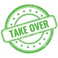 TAKE OVER text on green grungy round rubber stamp