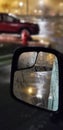 Wet side mirror on a foggy night Royalty Free Stock Photo