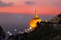 Take photo the Kyaikhtiyo Golden Rock pagoda and temple and beautiful sunshine view. This Photo contain burry and soft focus.,