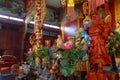 Take photo wooden sculpture of Lost Bladesman as Guan Yu on the altar inside the Chinese buddist building