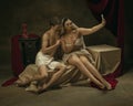 Modern remake of classical artwork with modern tech theme - young medieval couple on dark background