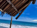 Take shelter under thatched roofs on the beach when the sky is clear