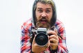 Take shoot. Man taking picture with photo camera. Hobby and travel. Royalty Free Stock Photo