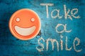 Take a smile. Motivational inscription.