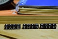 Take this step written on wooden blocks. Education and business concept Royalty Free Stock Photo