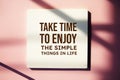 Take time to enjoy the simple things in life text message motivational and inspiration quote Royalty Free Stock Photo