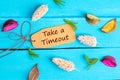 Take a timeout text on paper tag Royalty Free Stock Photo