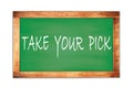 TAKE  YOUR  PICK text written on green school board Royalty Free Stock Photo