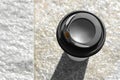 Takeaway coffee cup on stone surface outdoors, top view. Space for text Royalty Free Stock Photo