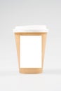 Takeaway cup of coffee with blank sheet paper for text mock up empty white space for logo brand isolated on background Royalty Free Stock Photo