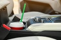 Takeaway paper coffee cup in holder car Royalty Free Stock Photo