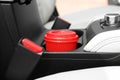Takeaway paper coffee cup in holder car Royalty Free Stock Photo