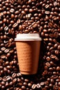 Takeaway paper cup of coffee with coffee beans