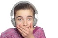 Taken aback teenage girl with headphones Royalty Free Stock Photo