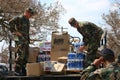 Air Force personnel load supplies for Hurricane Katrina victims