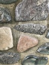 A rock and cement fireplace in a ski lodge. Royalty Free Stock Photo