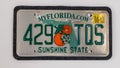 Taken off register car licence plate from state Florida in United States of America. Royalty Free Stock Photo