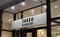 TAKEO KIKUCHI shop entrance sign