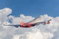 Takeoff of the Boeing 747-400 EI-XLM of the Rossiya airline. A large plane against the backdrop of a picturesque sky in Royalty Free Stock Photo