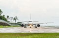 Takeoff plane in airport on rainy day Royalty Free Stock Photo